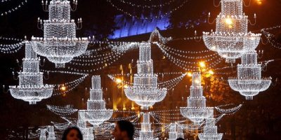 People walk on the street illuminated with Christmas decorations in Tbilisi, December 6, 2009. REUTERS/David Mdzinarishvili(GEORGIA SOCIETY RELIGION IMAGES OF THE DAY)